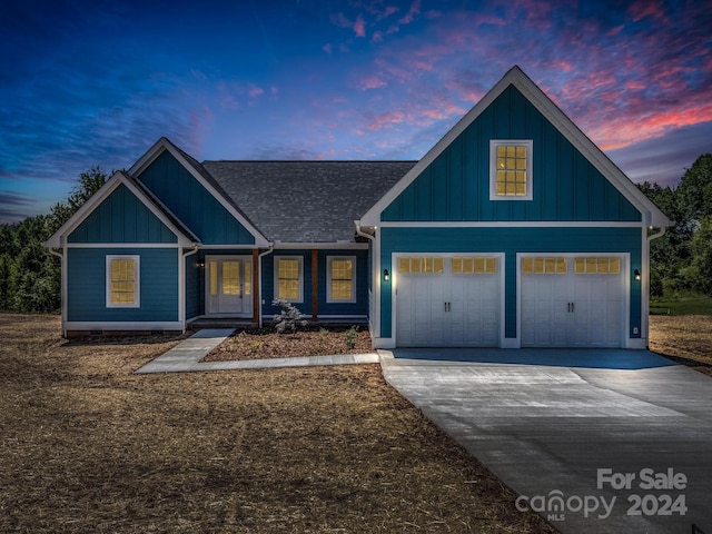 view of front of home with a garage