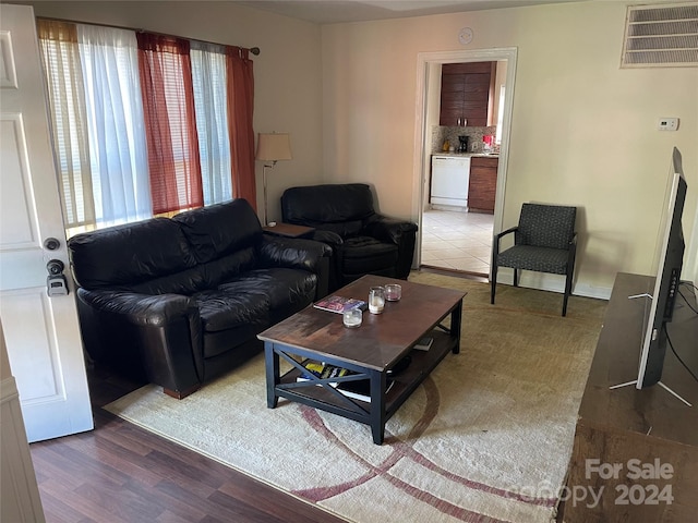 living room featuring dark hardwood / wood-style flooring