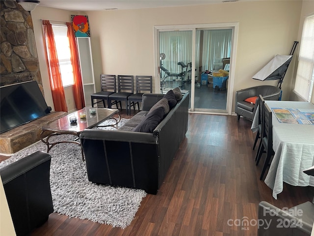 living room featuring dark hardwood / wood-style flooring