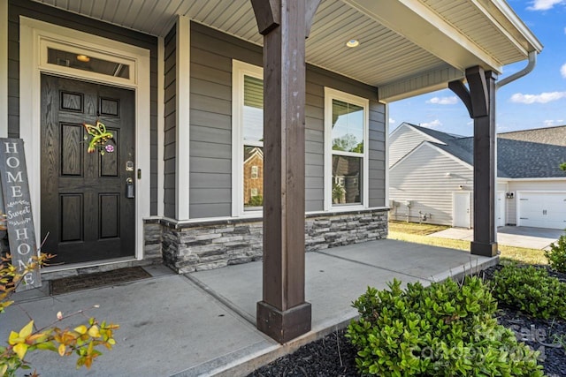 doorway to property with a porch