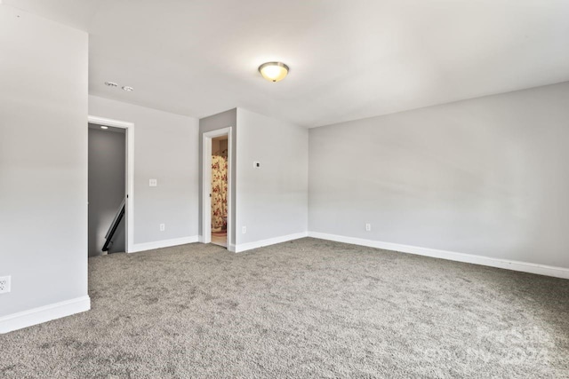 empty room featuring carpet floors