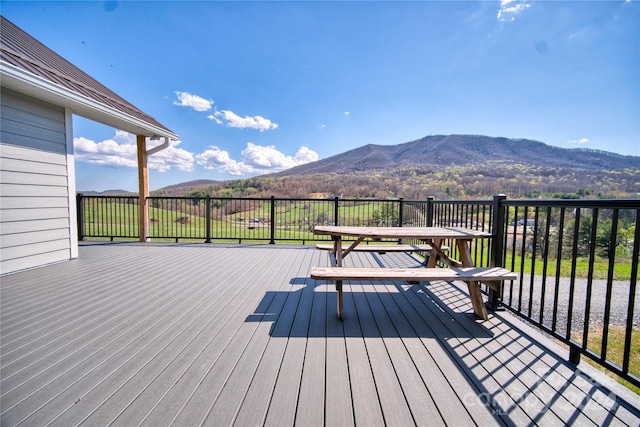 wooden terrace with a mountain view