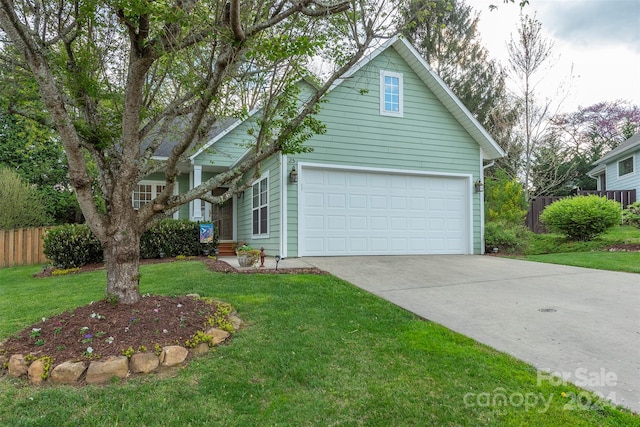 view of front facade featuring a garage and a front lawn