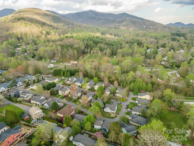 drone / aerial view featuring a mountain view