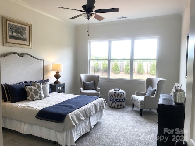 carpeted bedroom with ceiling fan