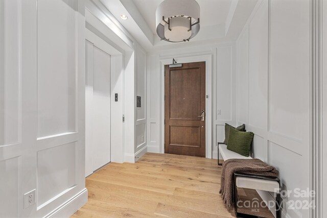 hallway featuring hardwood / wood-style flooring