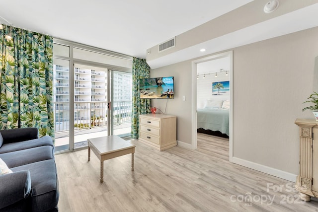 living area featuring light hardwood / wood-style flooring