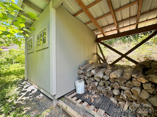 view of home's exterior featuring an outbuilding