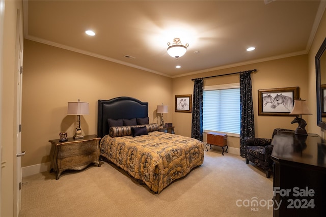 bedroom with crown molding and light colored carpet