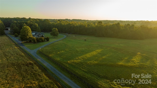 aerial view at dusk with a rural view