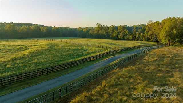 view of community with a rural view