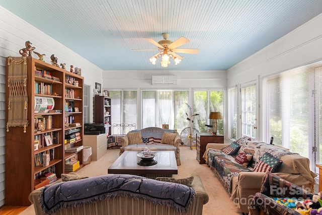 carpeted living room with ceiling fan and a wall mounted air conditioner