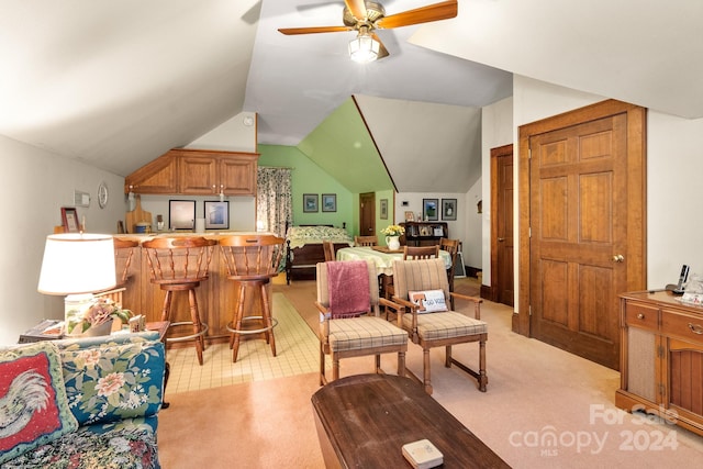 carpeted living room with lofted ceiling and ceiling fan