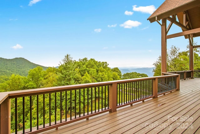 wooden terrace with a mountain view