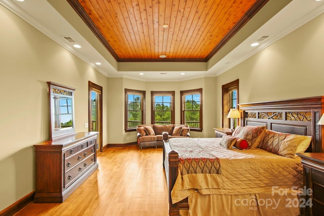 bedroom featuring wood ceiling, a raised ceiling, ornamental molding, and light hardwood / wood-style flooring