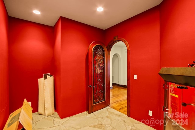 691 Dogwood Ln, Blowing Rock, NC 28605 - corridor featuring recessed lighting, arched walkways, and wood finished floors
