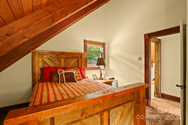 carpeted bedroom featuring wooden ceiling