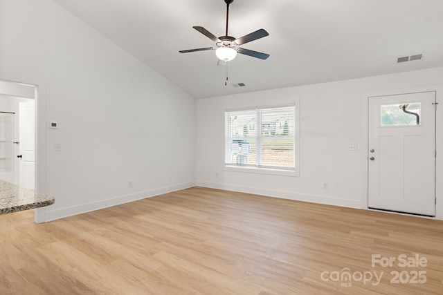 entrance foyer featuring high vaulted ceiling, ceiling fan, and light wood-type flooring