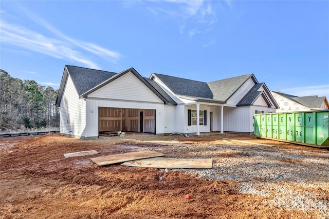 modern farmhouse with a garage