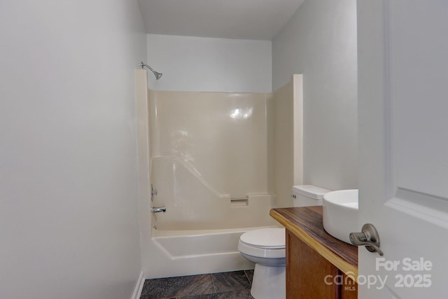 full bath with shower / bath combination, vanity, and toilet