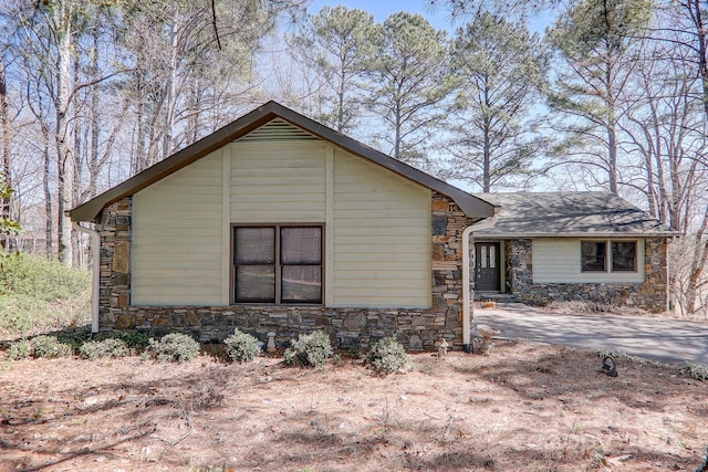 view of home's exterior with stone siding