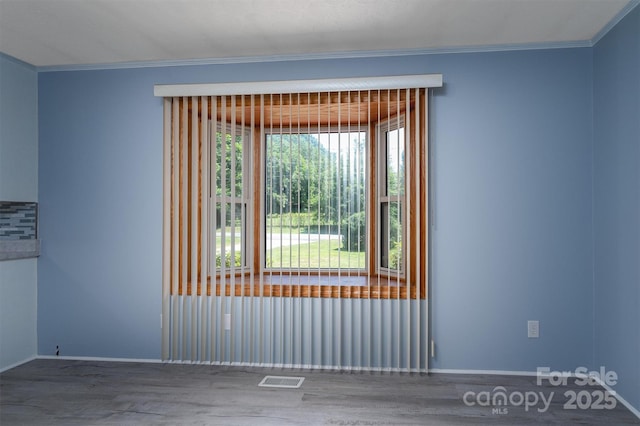 spare room with ornamental molding