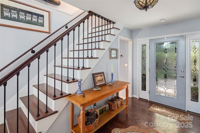 270 Ridge Dr, Saluda, NC 28773 - entrance foyer featuring stairs, wood finished floors, and baseboards