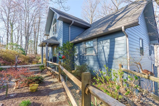 270 Ridge Dr, Saluda, NC 28773 - view of home's exterior with a shingled roof