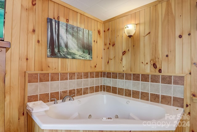 bathroom with wood walls