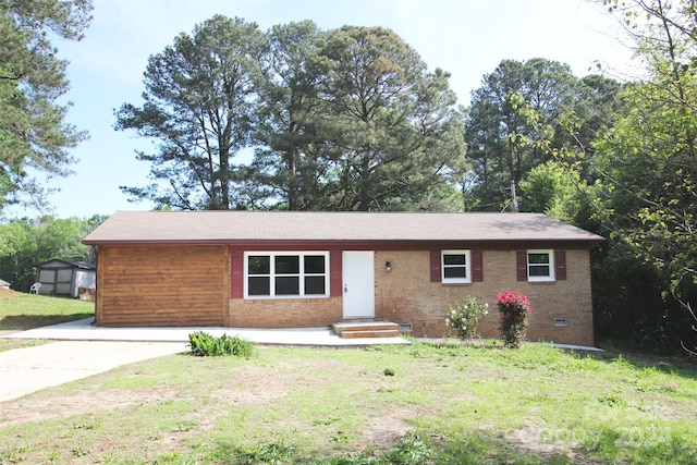 ranch-style home with a front lawn