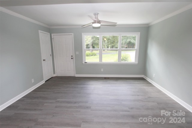 unfurnished room with ceiling fan, ornamental molding, and hardwood / wood-style flooring