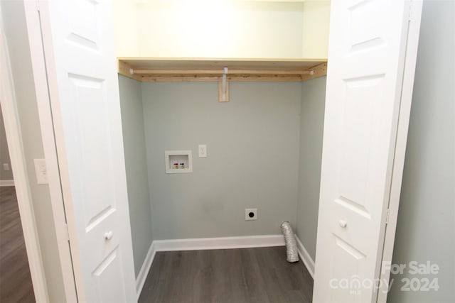 washroom featuring dark hardwood / wood-style floors, hookup for a washing machine, and electric dryer hookup