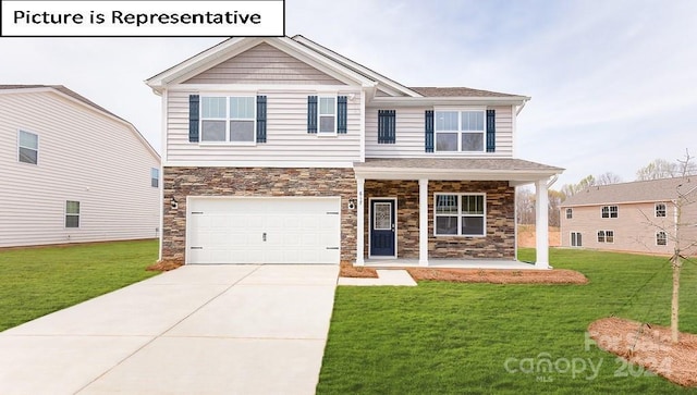 craftsman inspired home with a porch, stone siding, a front yard, and driveway