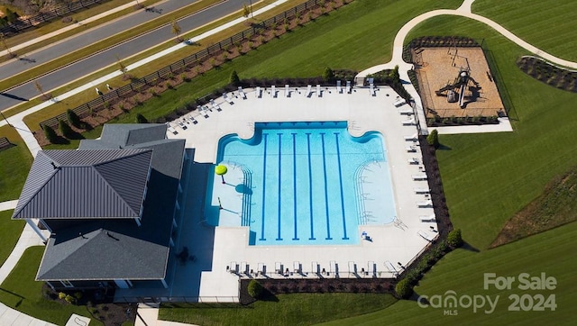 view of swimming pool featuring a patio