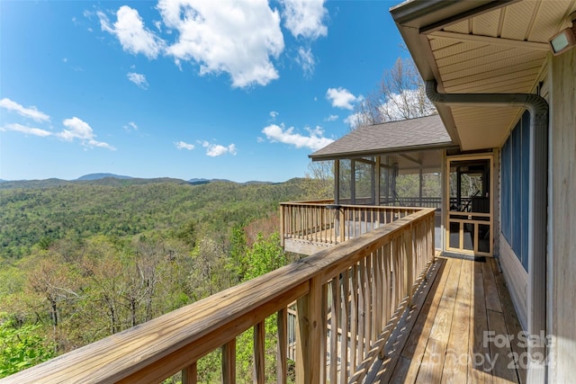 wooden balcony featuring a wooden deck