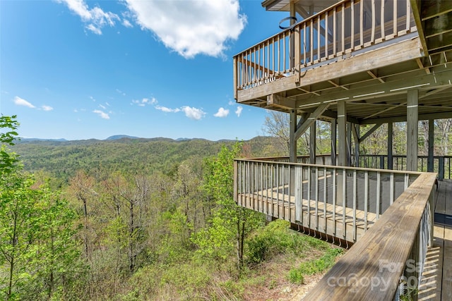 view of yard featuring a wooden deck