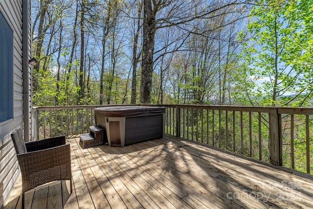 deck with a hot tub