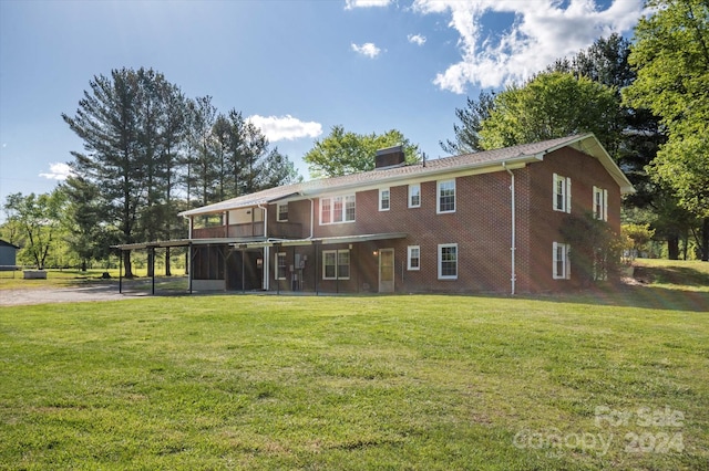 view of front of home with a front lawn