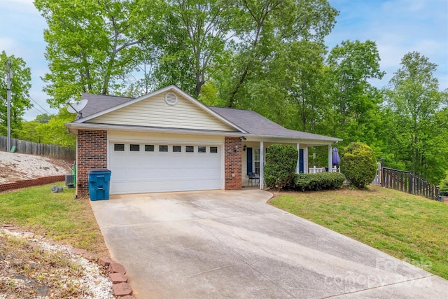 ranch-style home with a garage and a front yard