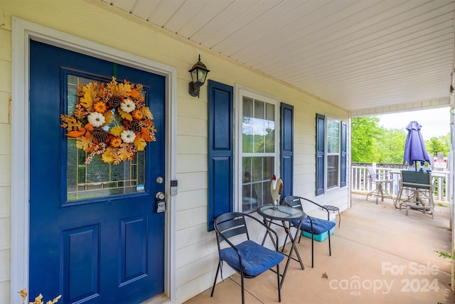 entrance to property with a porch