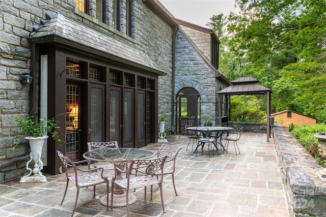 view of patio featuring a gazebo and french doors