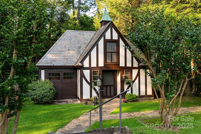 436 Vanderbilt Rd, Asheville, NC 28803 - view of front facade featuring stucco siding and a front yard