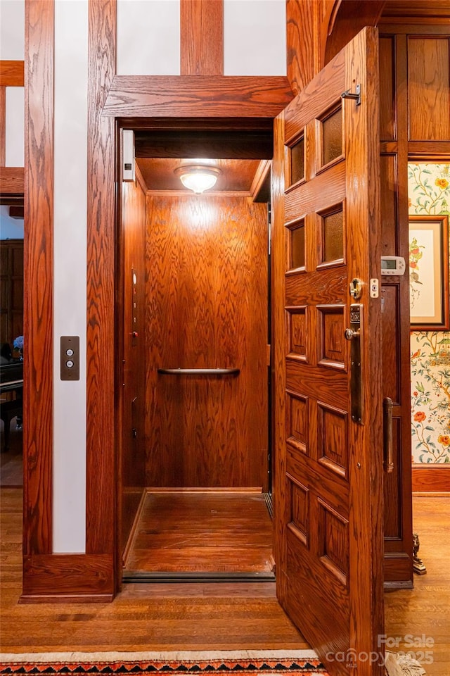 436 Vanderbilt Rd, Asheville, NC 28803 - elevator featuring wood finished floors
