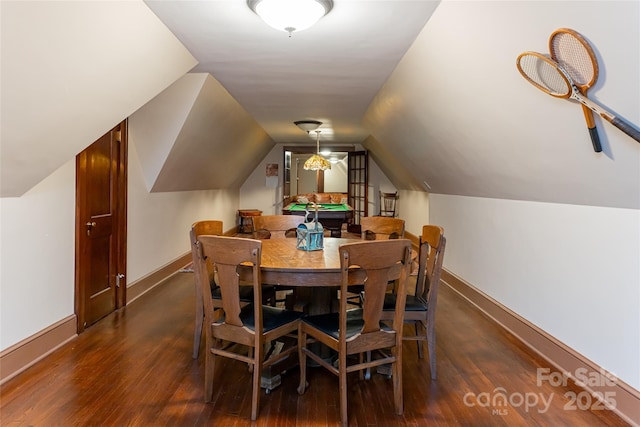 436 Vanderbilt Rd, Asheville, NC 28803 - dining space featuring dark wood-style flooring, baseboards, and lofted ceiling