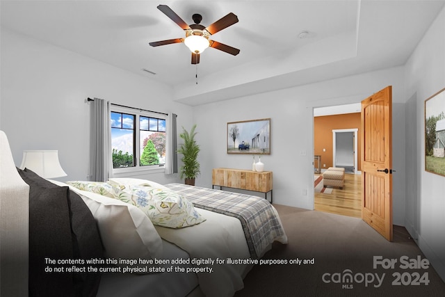 bedroom with light colored carpet and ceiling fan