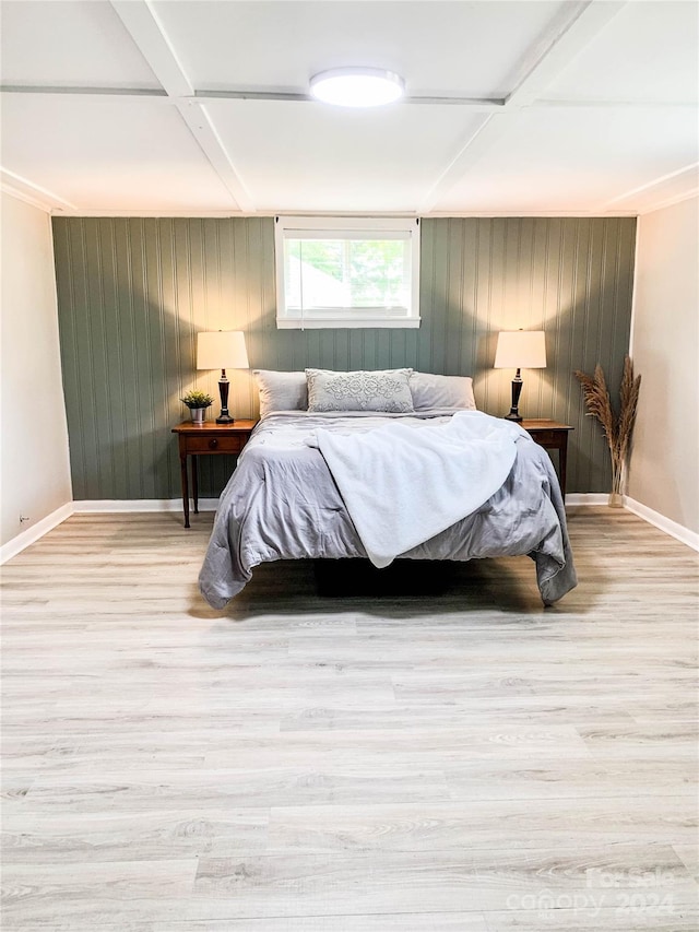 bedroom featuring wood-type flooring and coffered ceiling