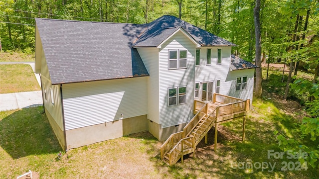 rear view of house with a deck