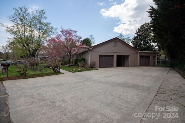 single story home with a garage