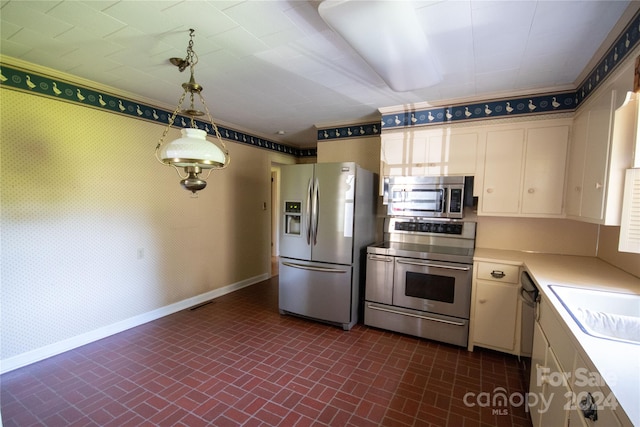 kitchen with hanging light fixtures and stainless steel appliances