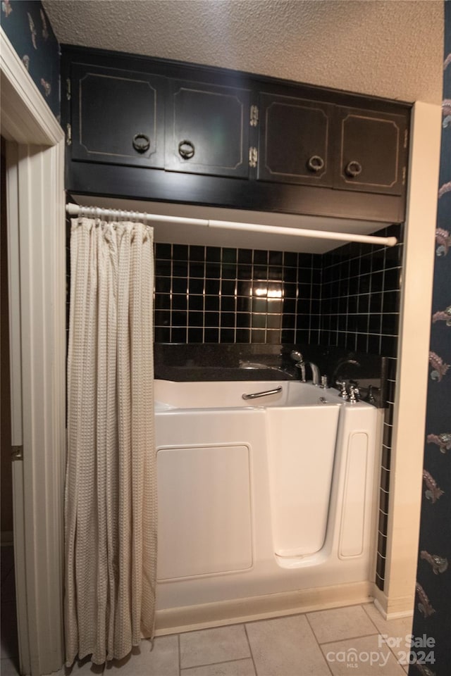 bathroom featuring tile flooring